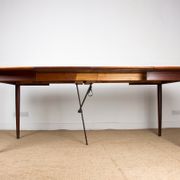 Expandable square teak dining table by Henry Walter Klein 1960