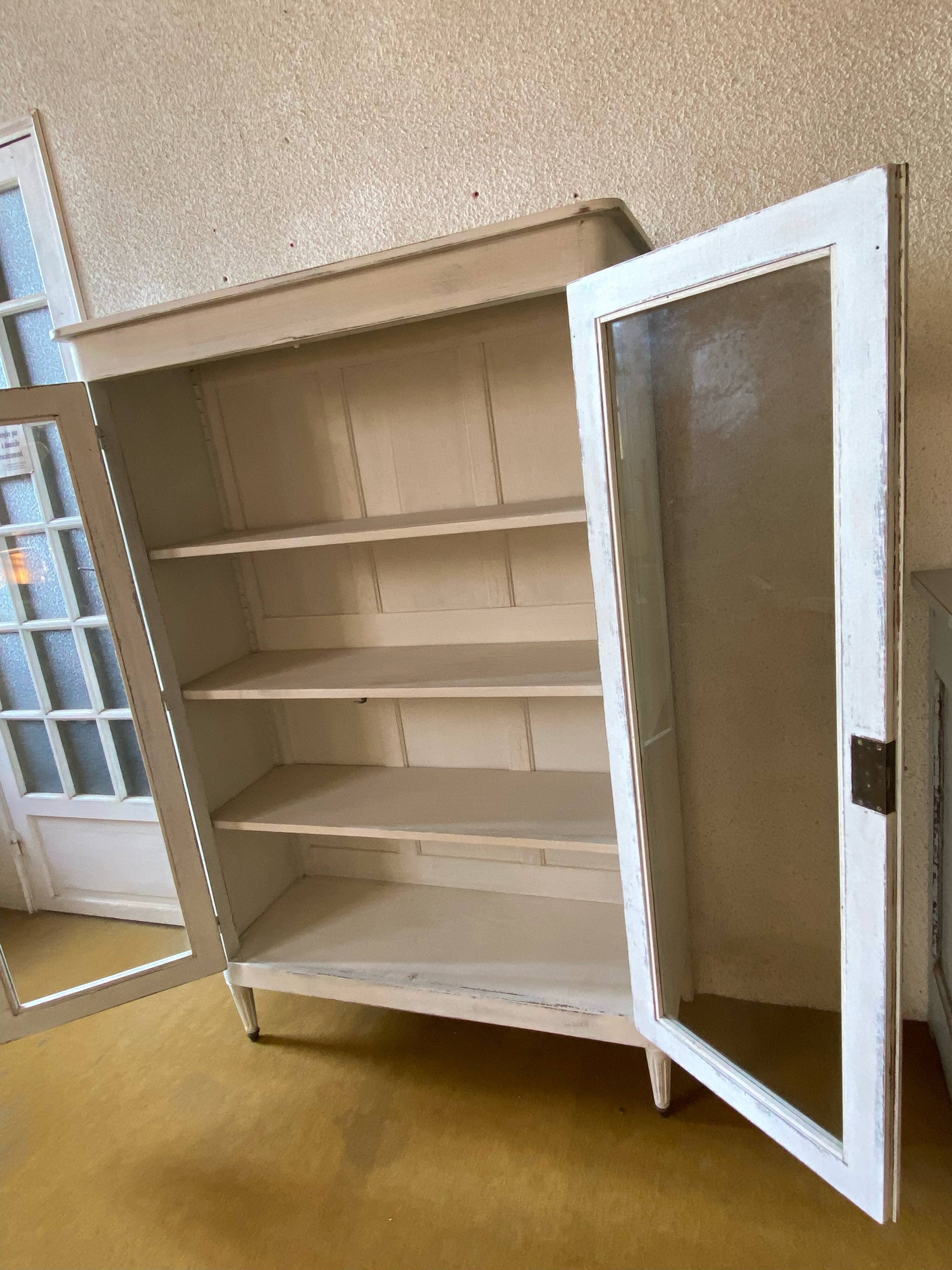 Painted glass bookcase, early 20th century