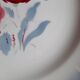 Old mismatched earthenware dinner plates