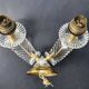 Wall lamp with palm leaf candle holders from the 1950s.