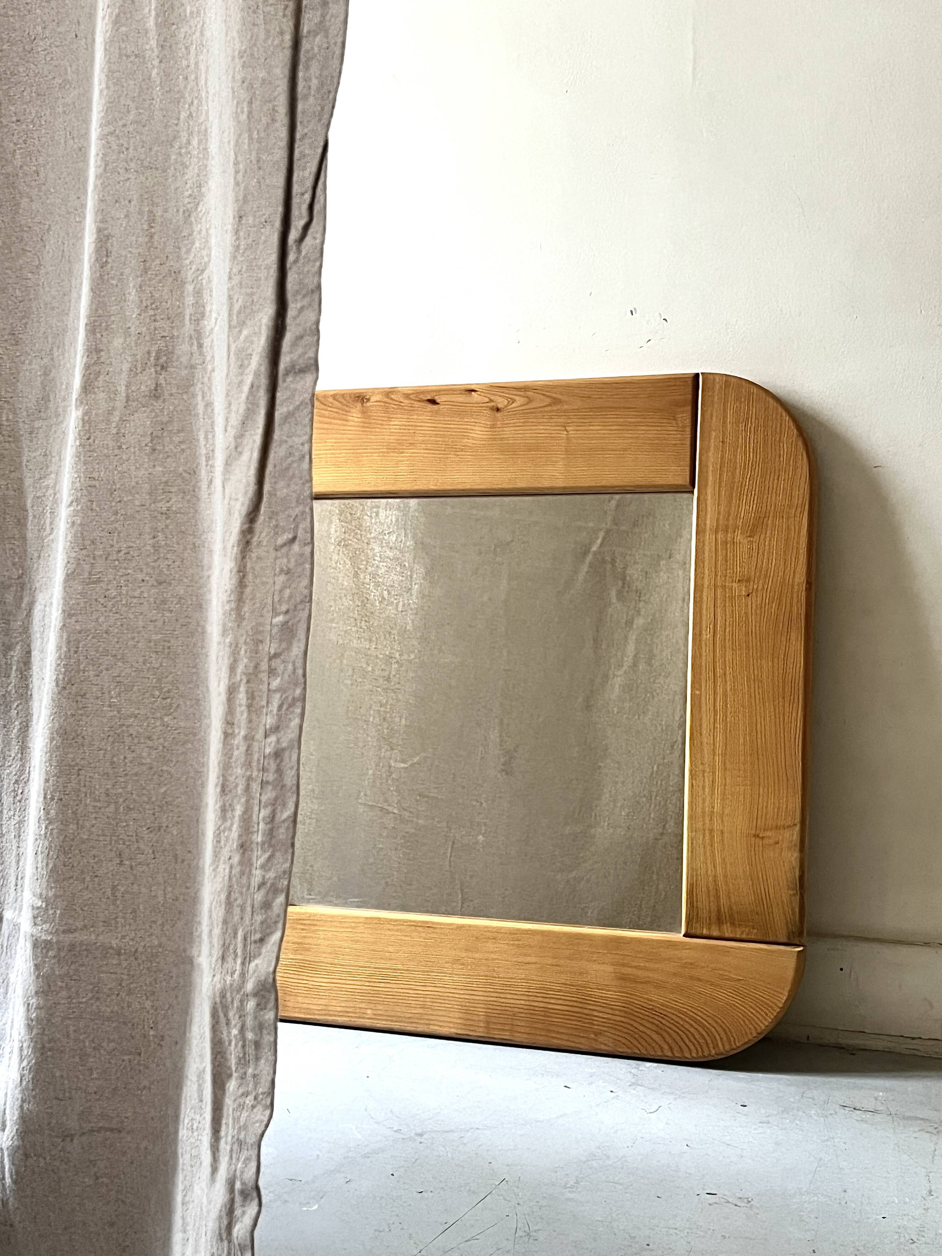 Large oak mirror in the style of a revival house, 1970s design.