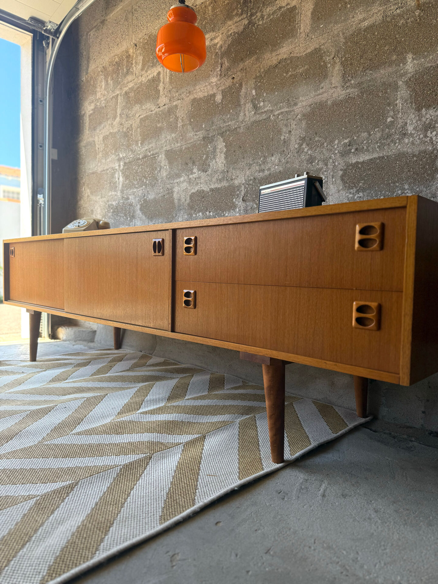 Scandinavian low sideboard in teak, 1970.