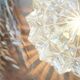 Table lamp with cut glass in the shape of a star.