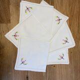 Cotton napkin edged by hand with flowers, France