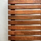 Bench / modernist coffee table made of wooden slats, 1970s design.