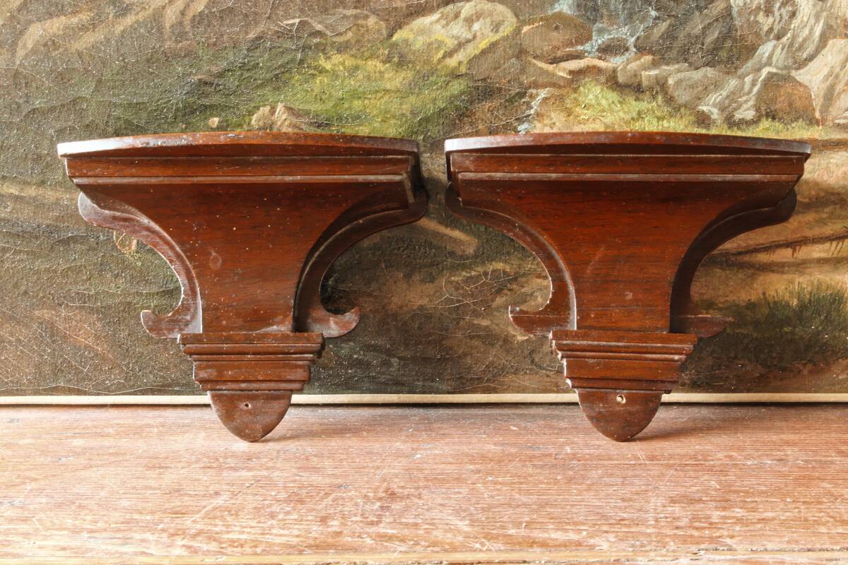 Pair of wall consoles in mahogany