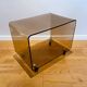 Coffee table, rolling side table by Michel Dumas for Roche Bobois, 1970.