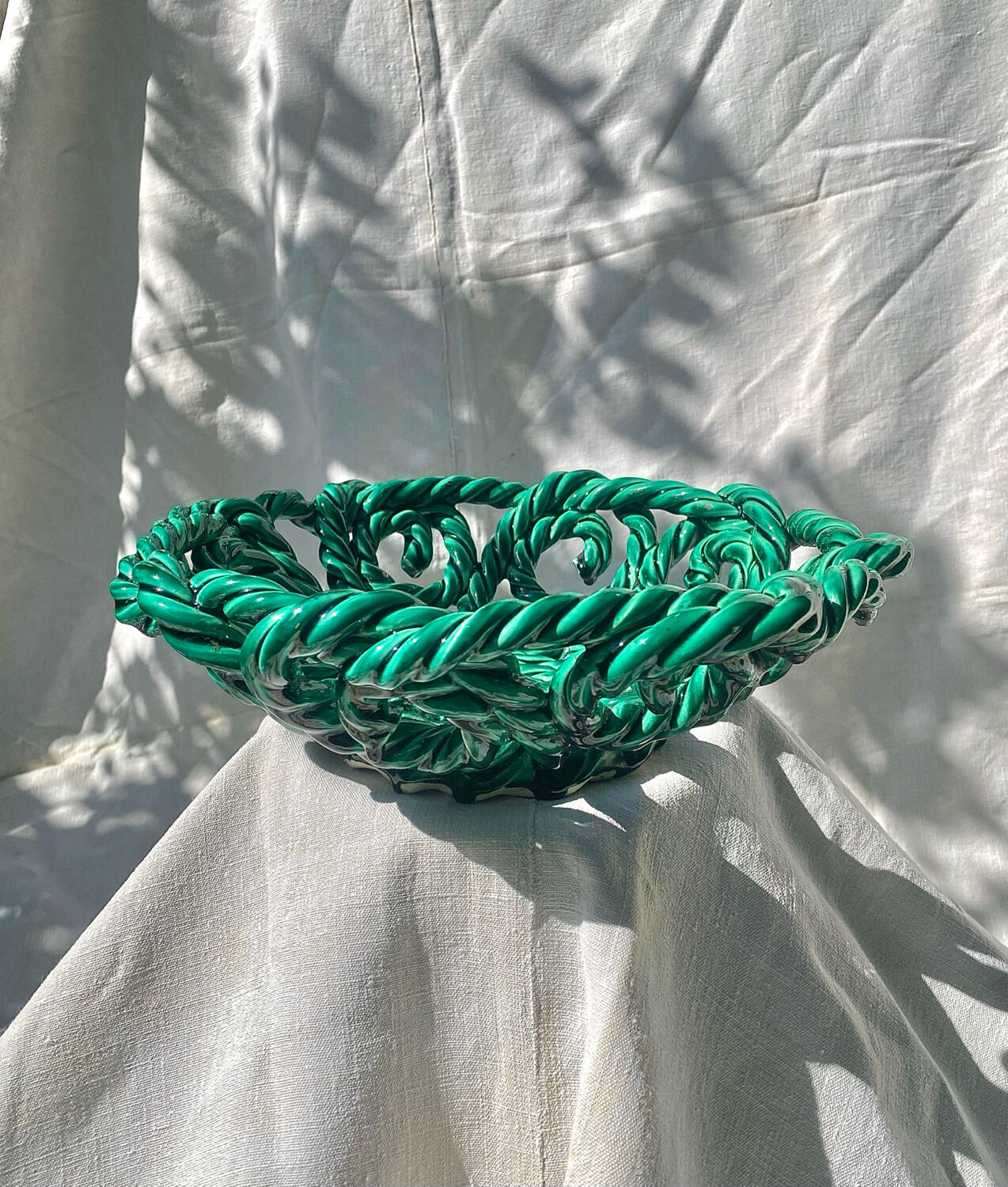 Large twisted green enamelled bowl