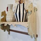 Antique wall shelf in raw wood