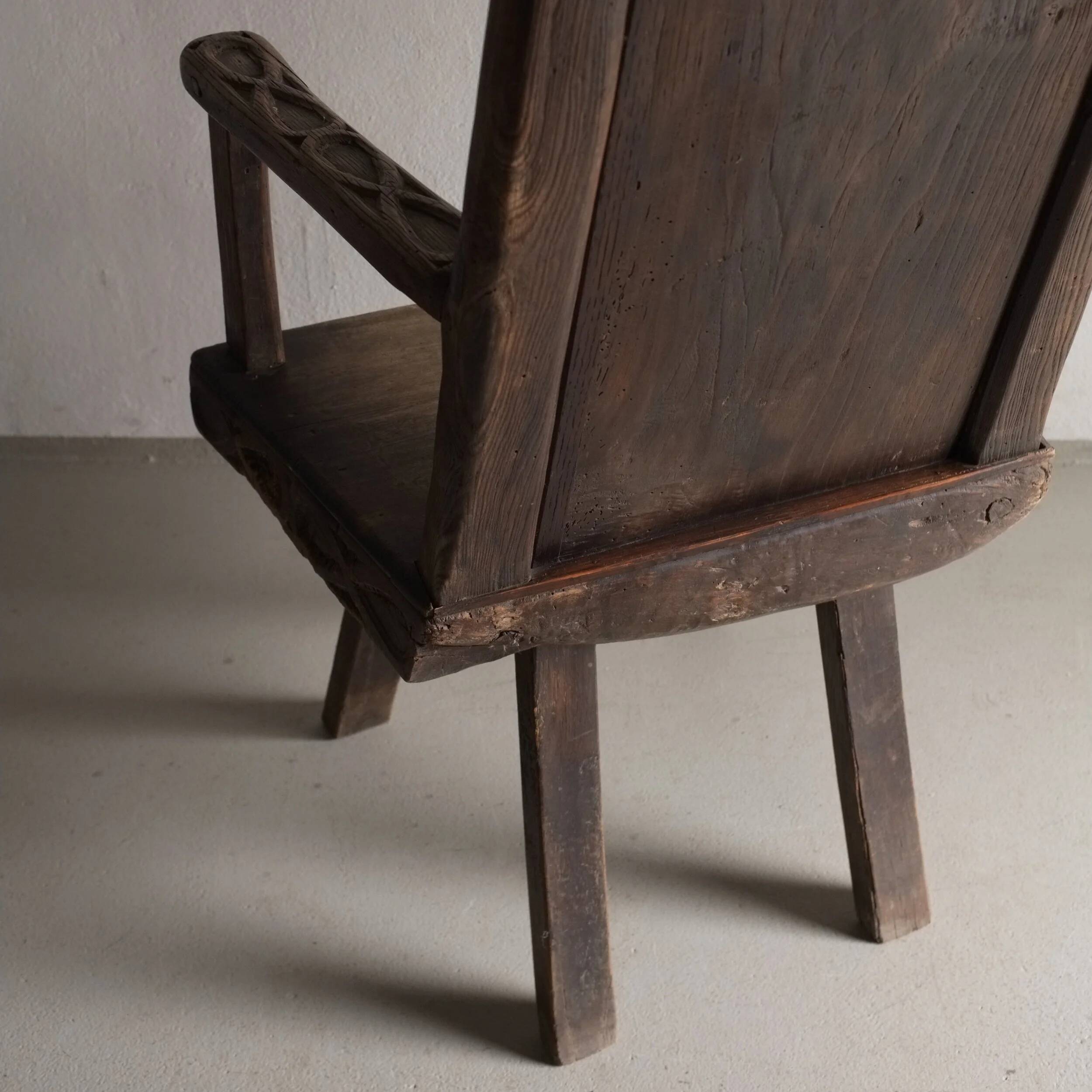 Antique primitive carved oak arm chair, Belgium