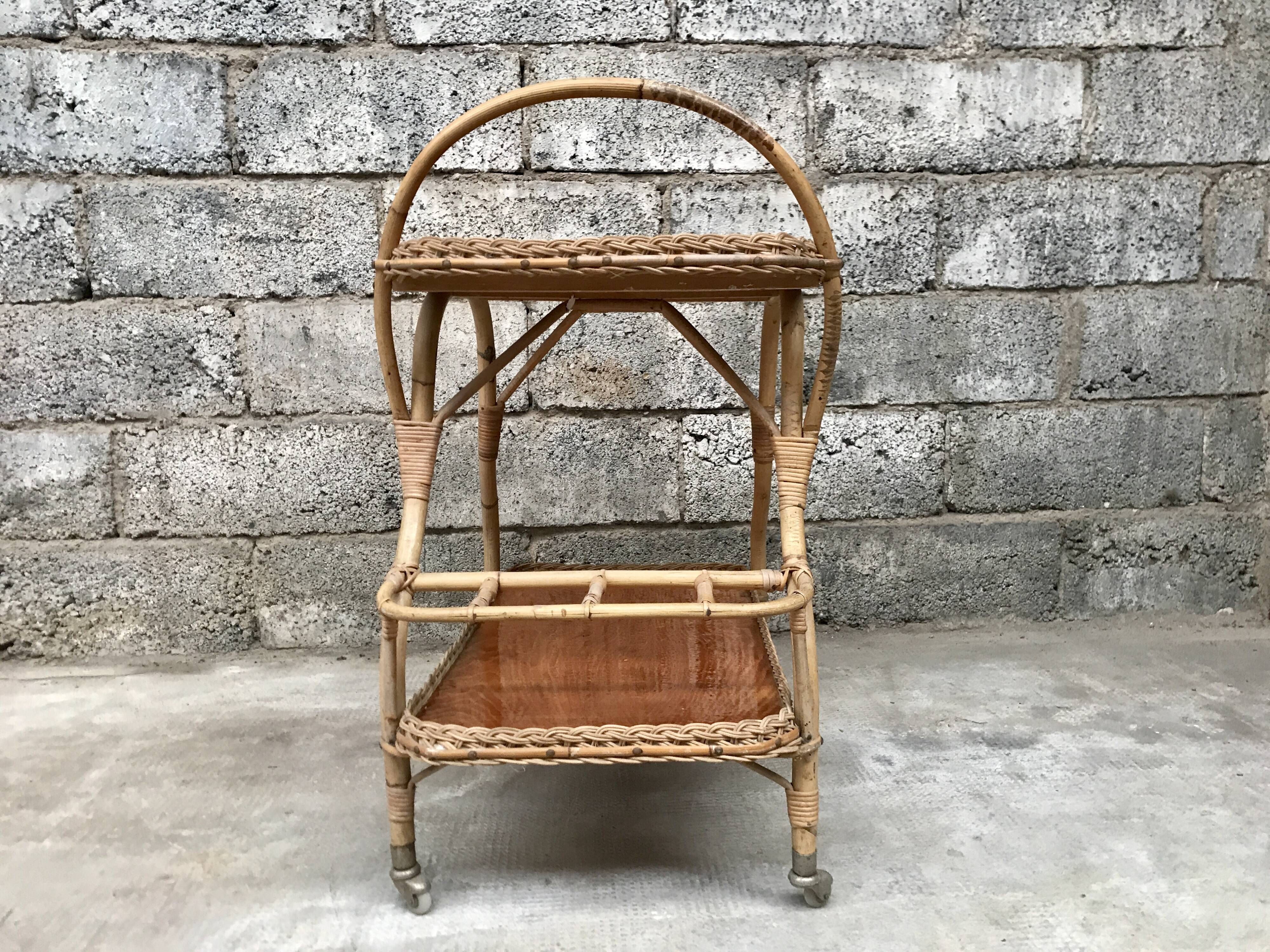 Rolling dessert in woven wicker bamboo rattan with 1950 bottle holder