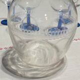Old carafe and its wine glasses