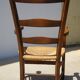 Fauteuil traditionnel en bois et paille