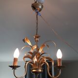 Vintage chandelier in golden metal