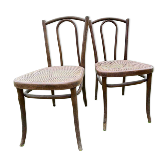 Pair of stamped Thonet bistro chairs, curved beech and cannage