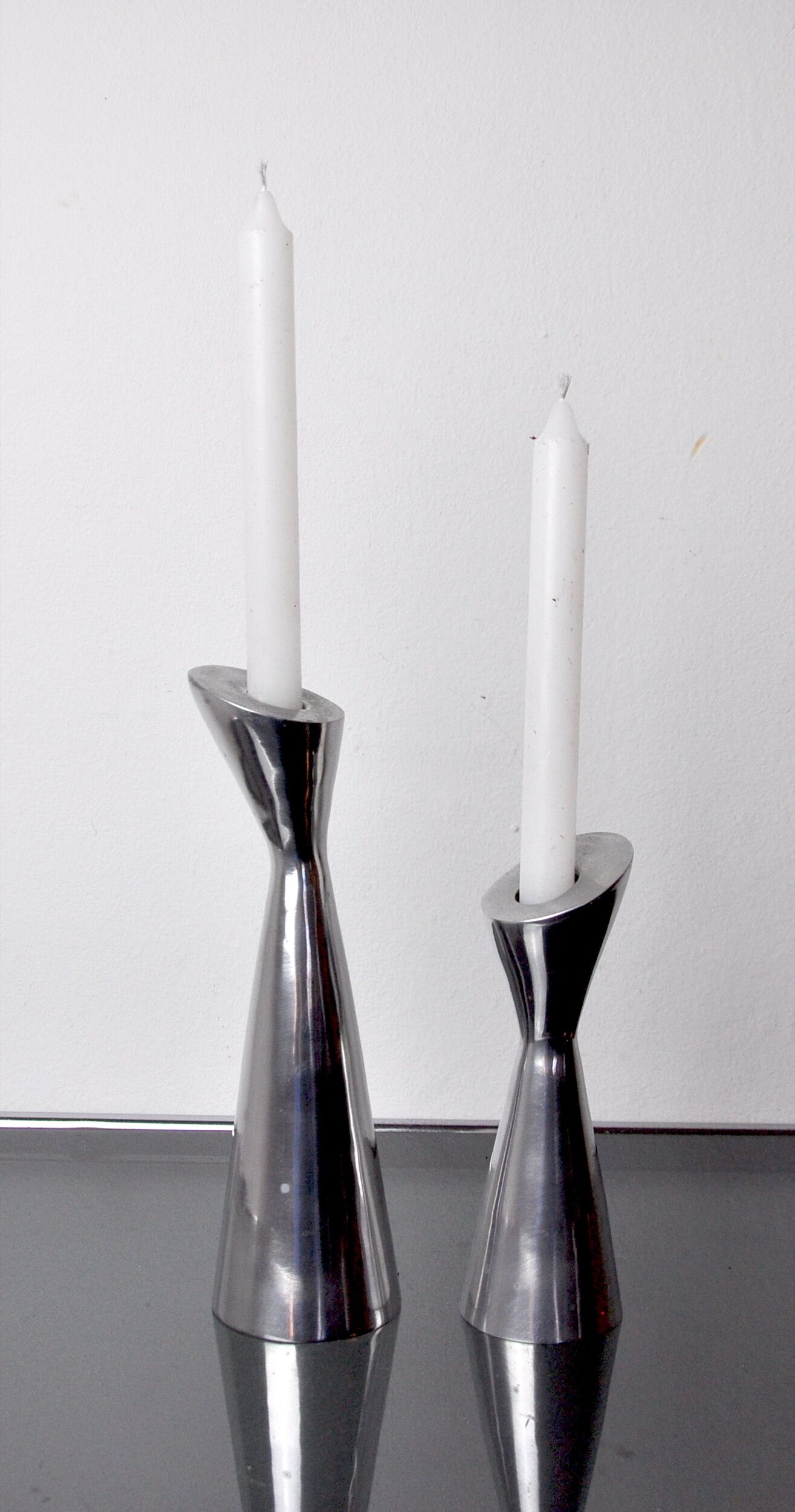 Pair of Swan candlesticks by Matthew Hilton, England, 1980
