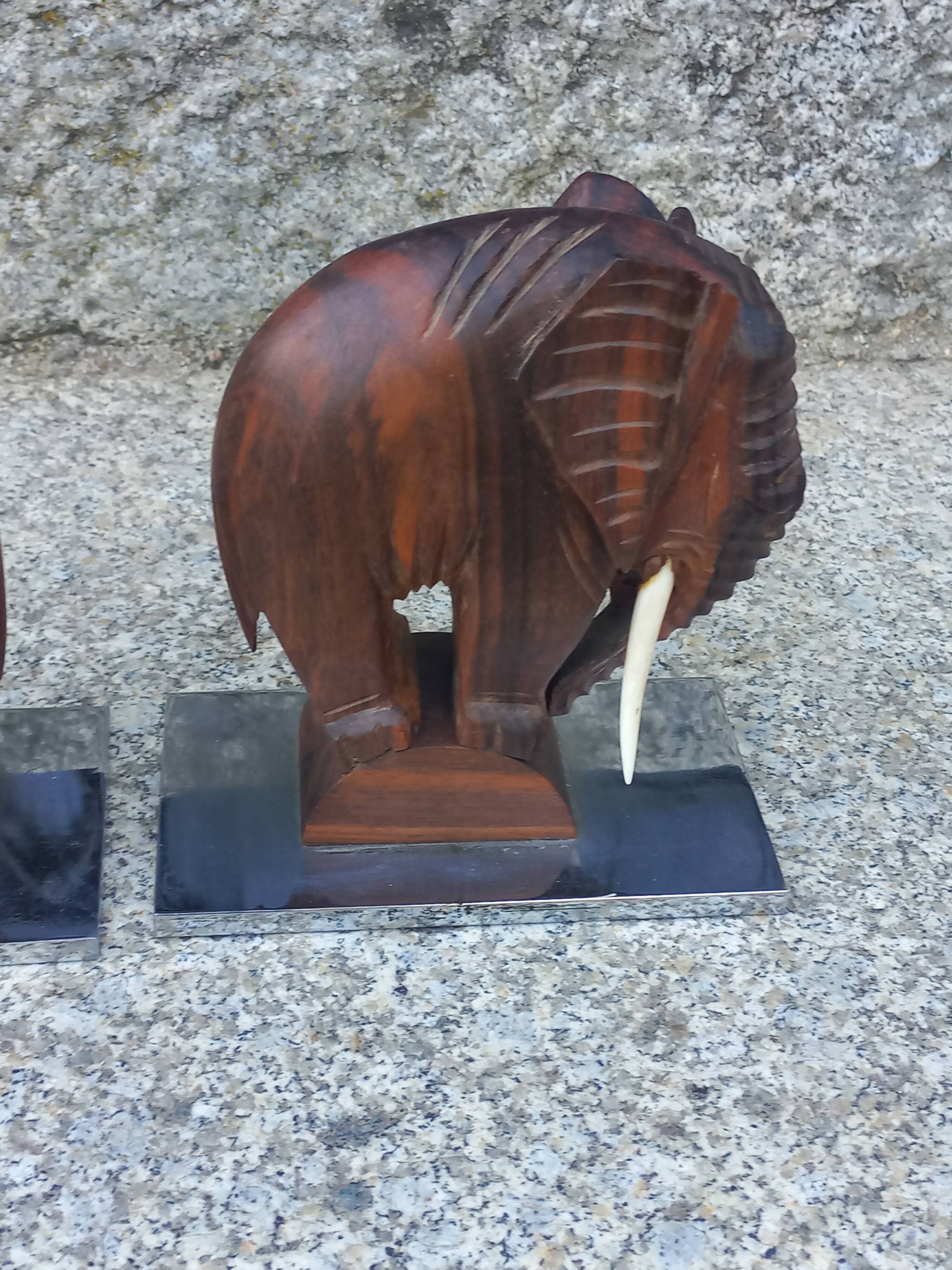 Pair of Art Deco elephant bookends in rosewood with chrome base.
