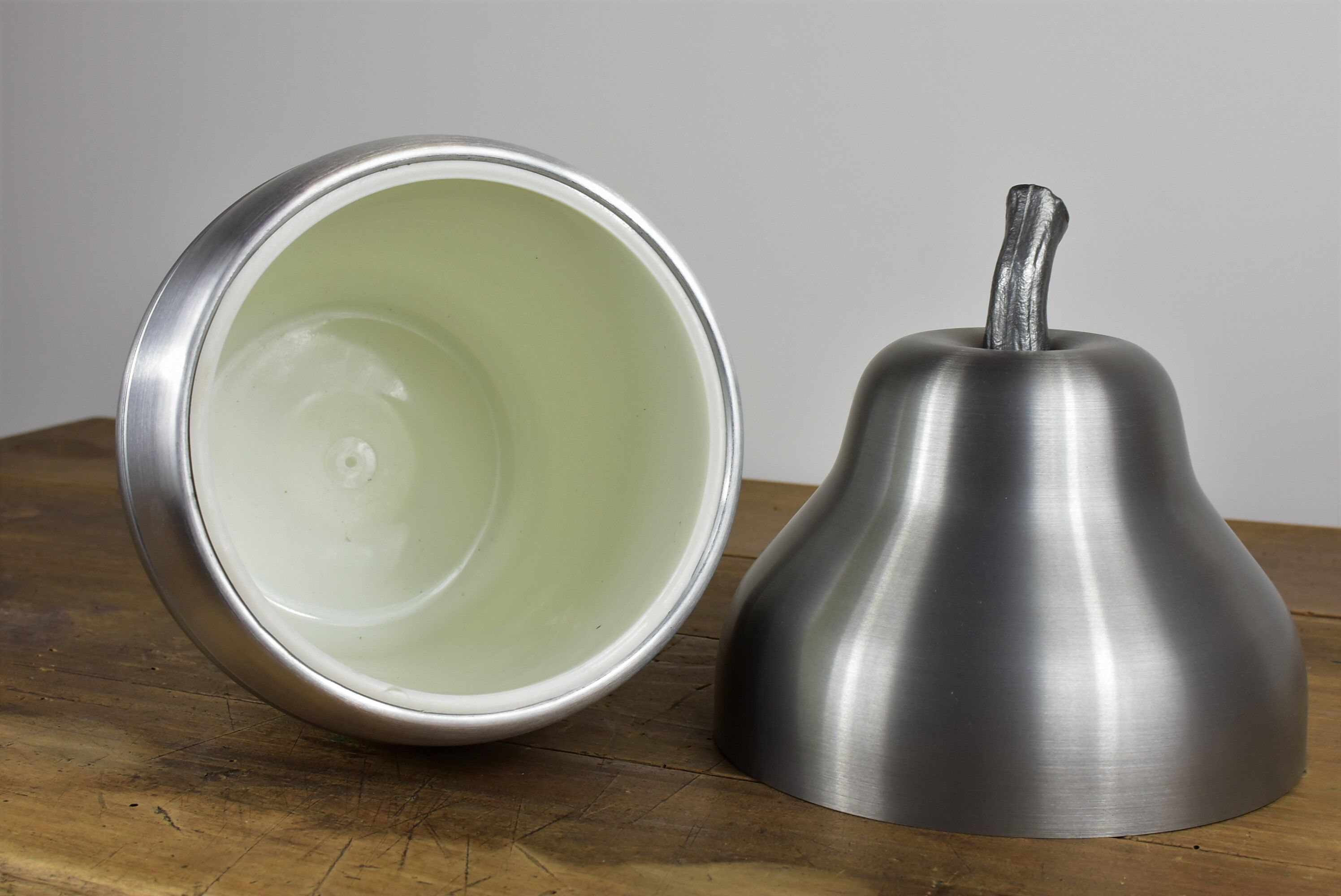 Pear-shaped ice bucket.