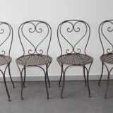 Set of 4 wrought iron chairs.