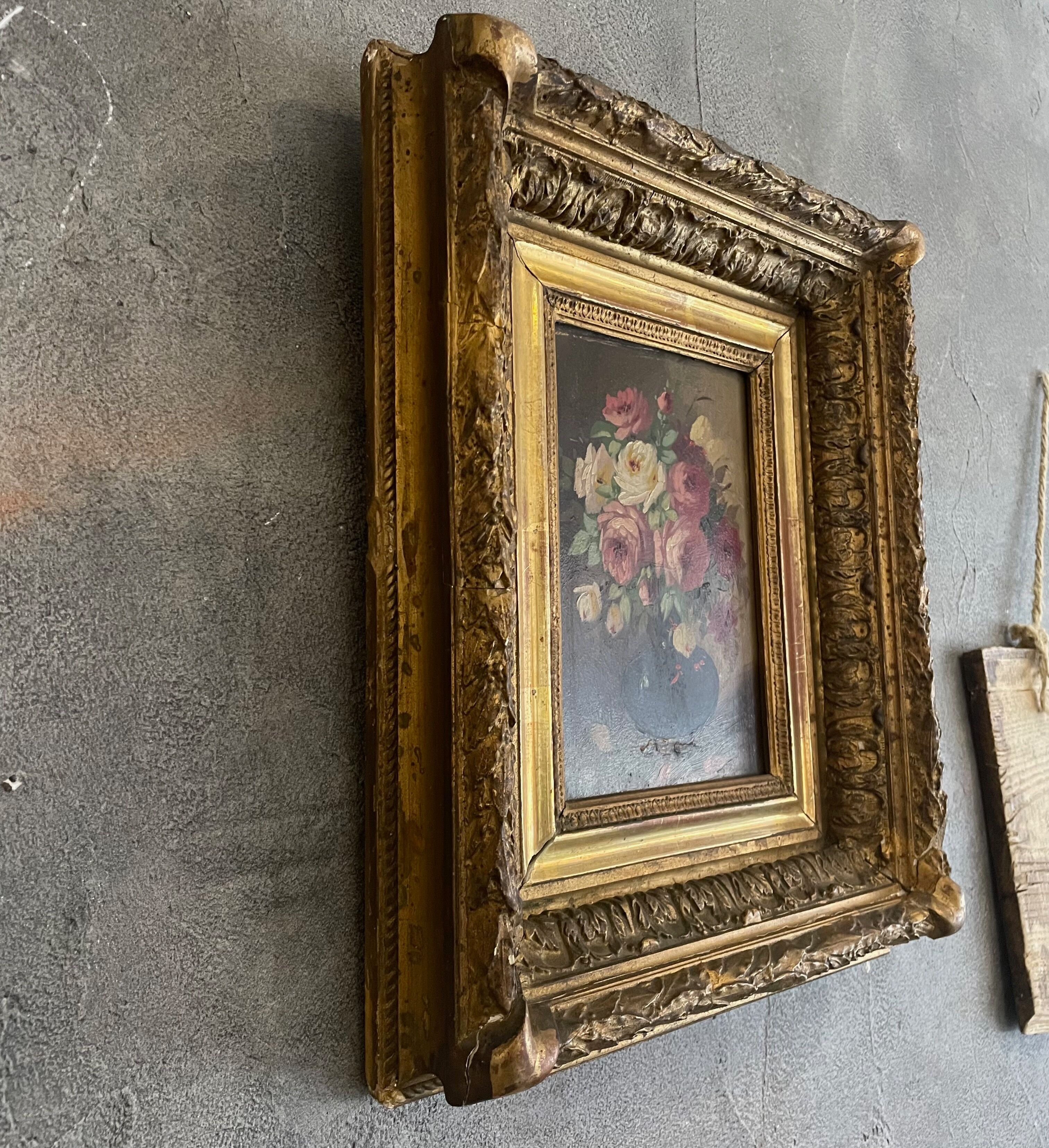 Golden framed flower bouquet painting