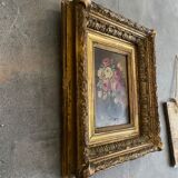 Golden framed flower bouquet painting