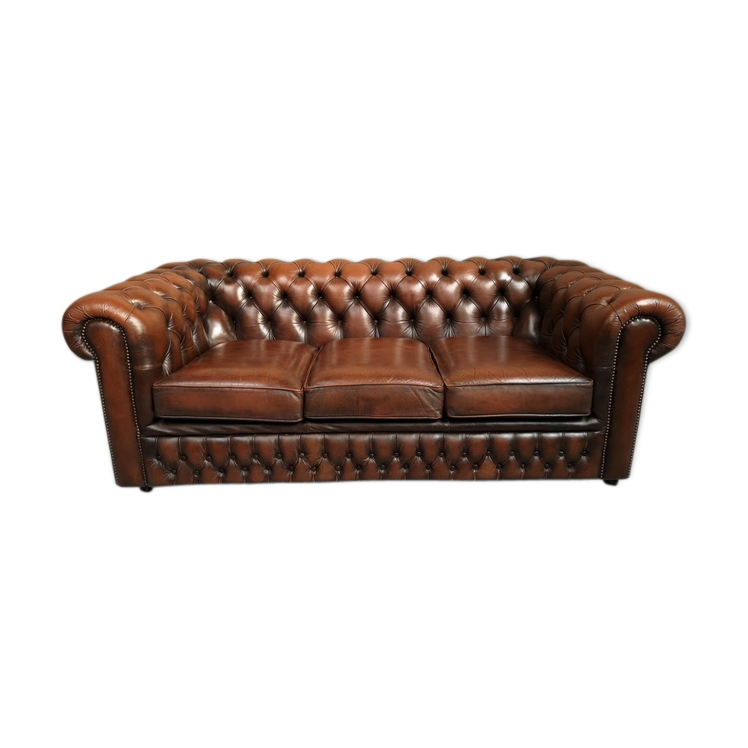 Brown leather chesterfield sofa