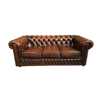 Brown leather chesterfield sofa