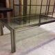 Coffee table with square tubular structure and smoked glass - 1970