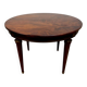 Extendable mahogany round table in Louis XVI style