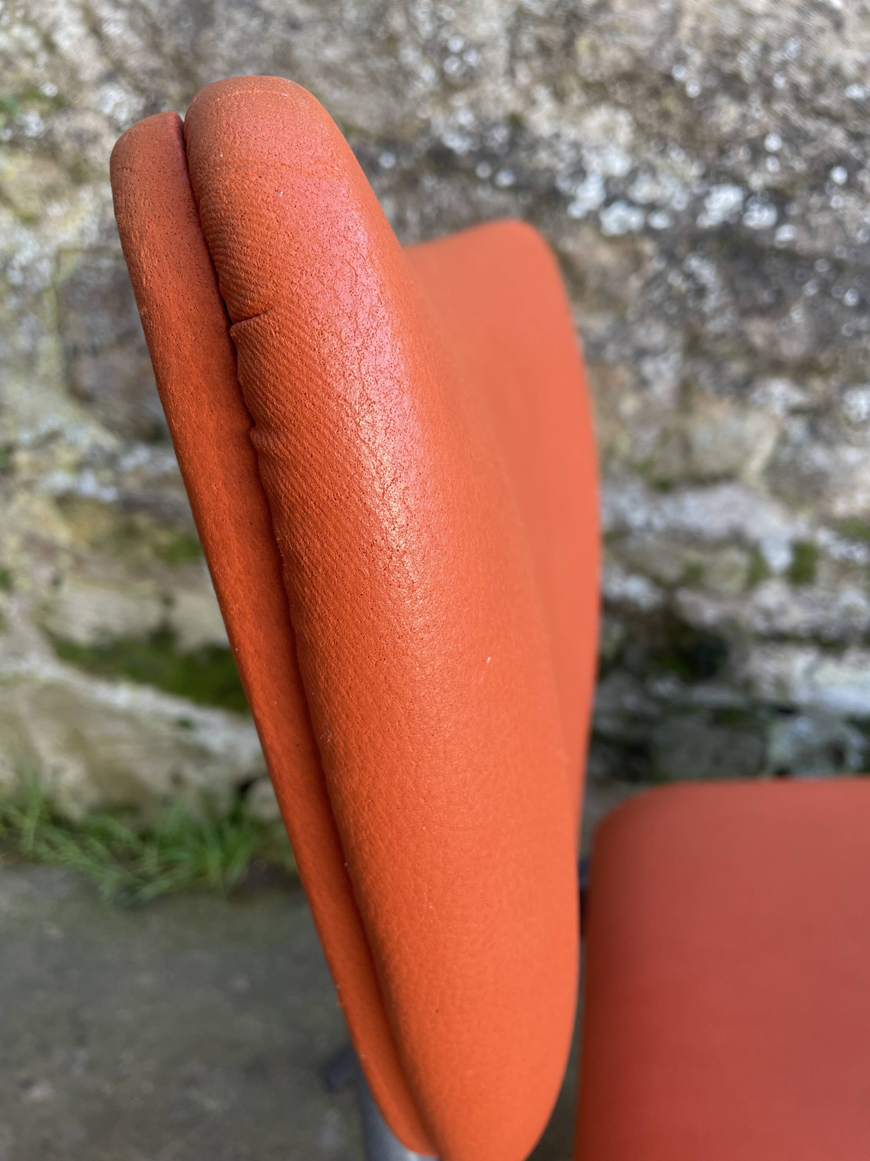Pair of faux leather armchairs