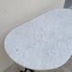 Restaurant bistro table in oval marble and decorated cast iron bases -1m51