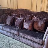 Purple velvet sofa