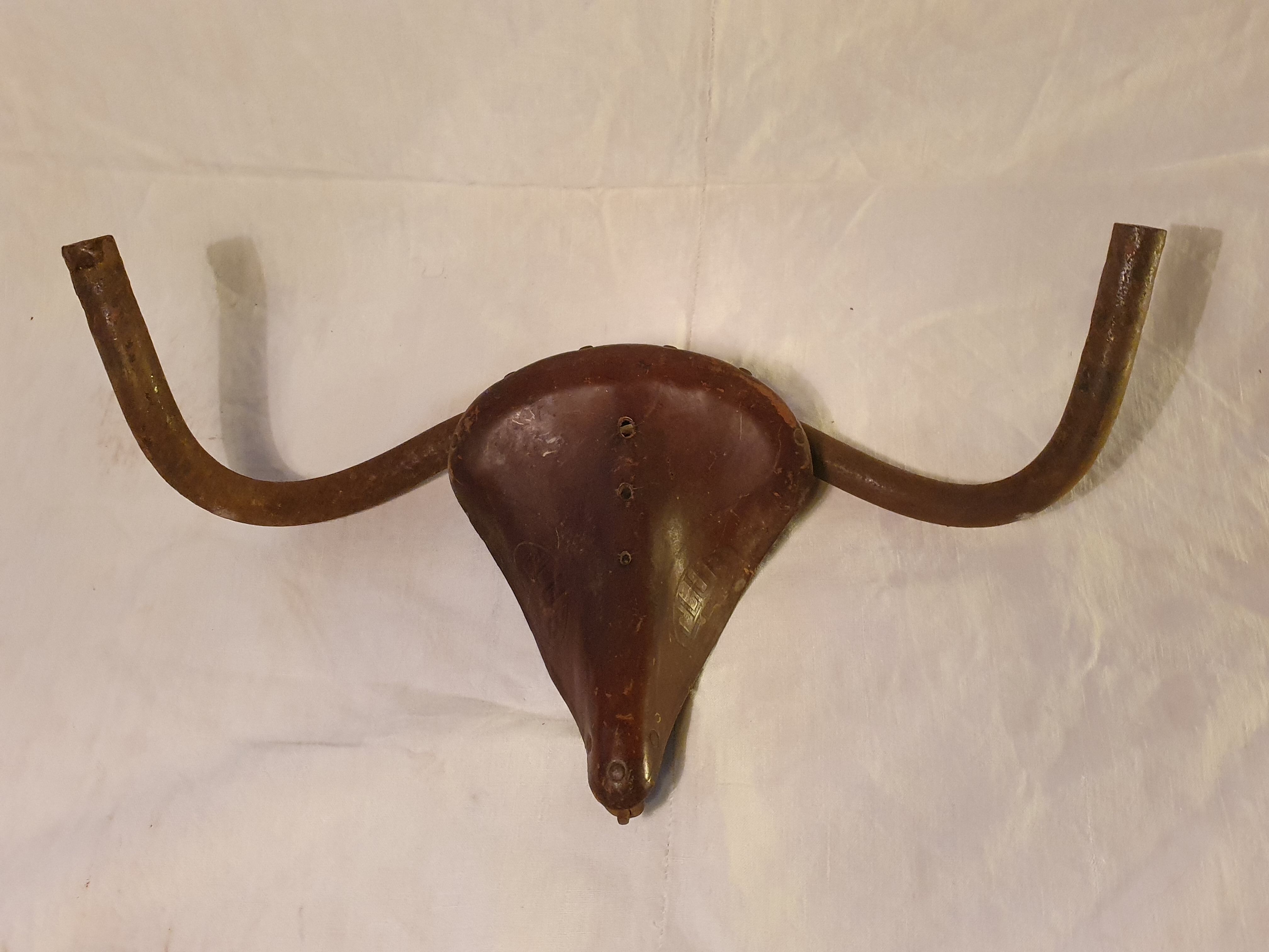 Brutalist bull head sculpture