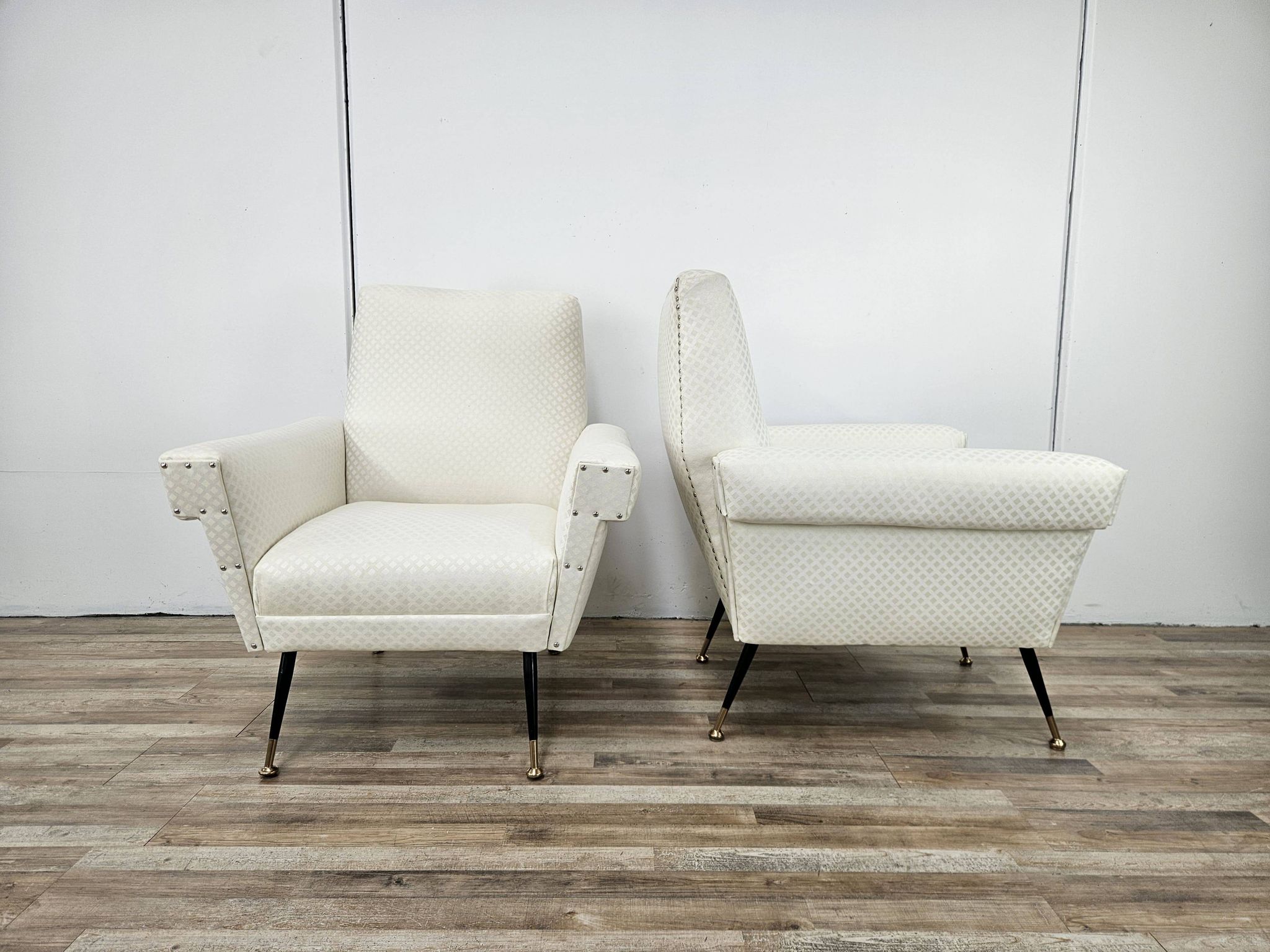 Italian armchairs from the 1950s in cream fabric with iron legs.
