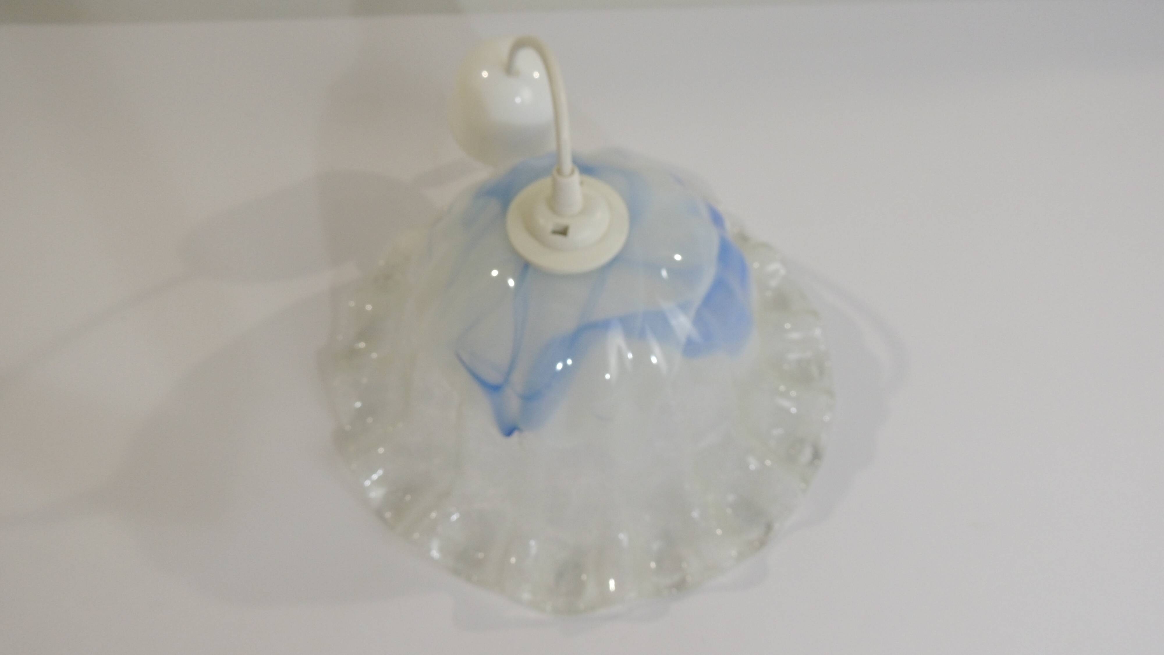 Vintage Murano blown glass suspension lamp with blue and white shell.