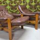 Pair of leather armchairs and an ottoman, Sweden 1970.
