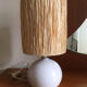 Ceramic table lamp and rafia