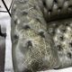 Fauteuil club Chesterfield vert antique