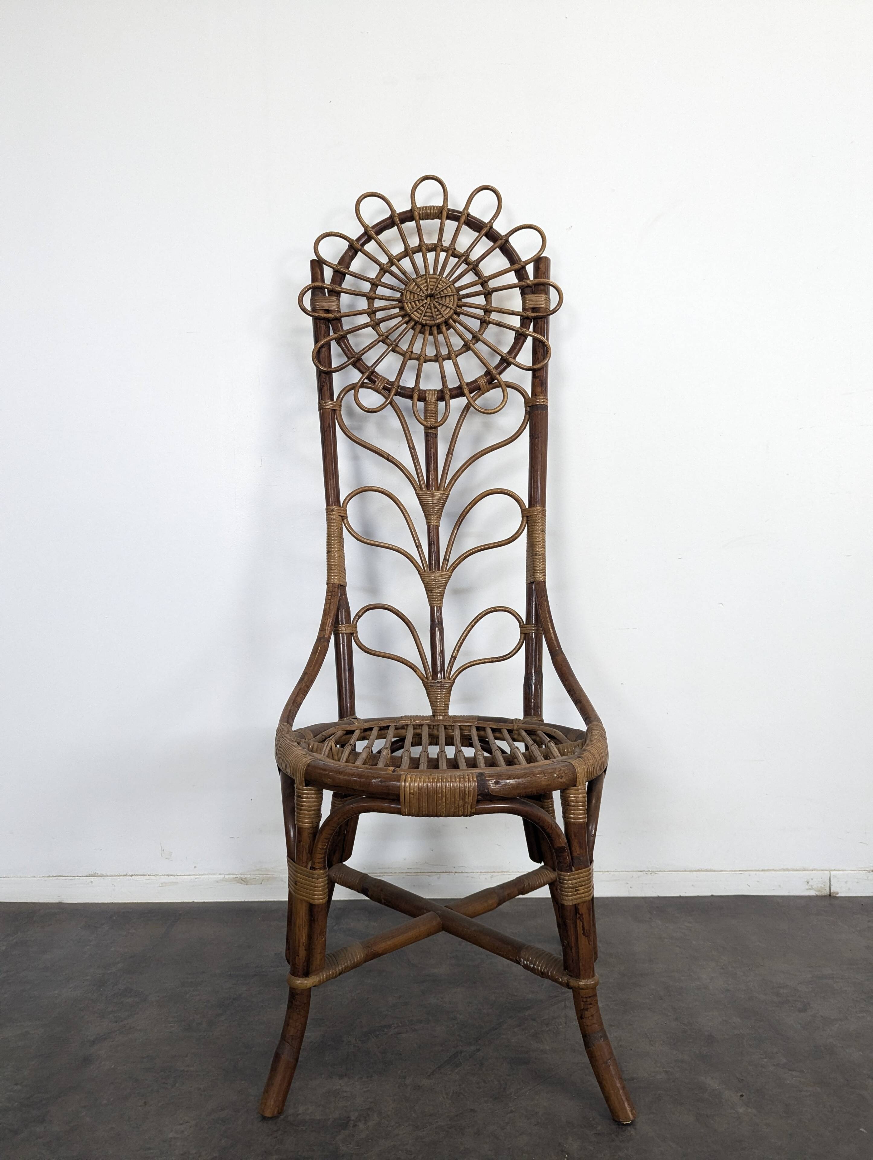 Set of 4 bamboo and rattan chairs with sunflower decoration.