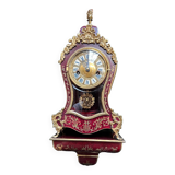 Boudoir clock on Louis XIV style console.