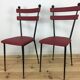 Pair of 50s metal and faux-leather chairs