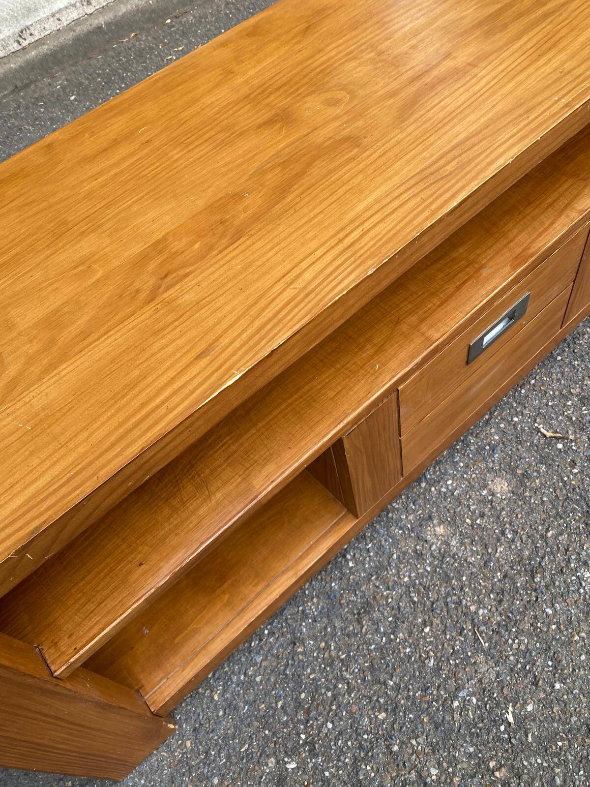 Solid pine wood TV unit stained with drawer and storage.