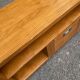 Solid pine wood TV unit stained with drawer and storage.