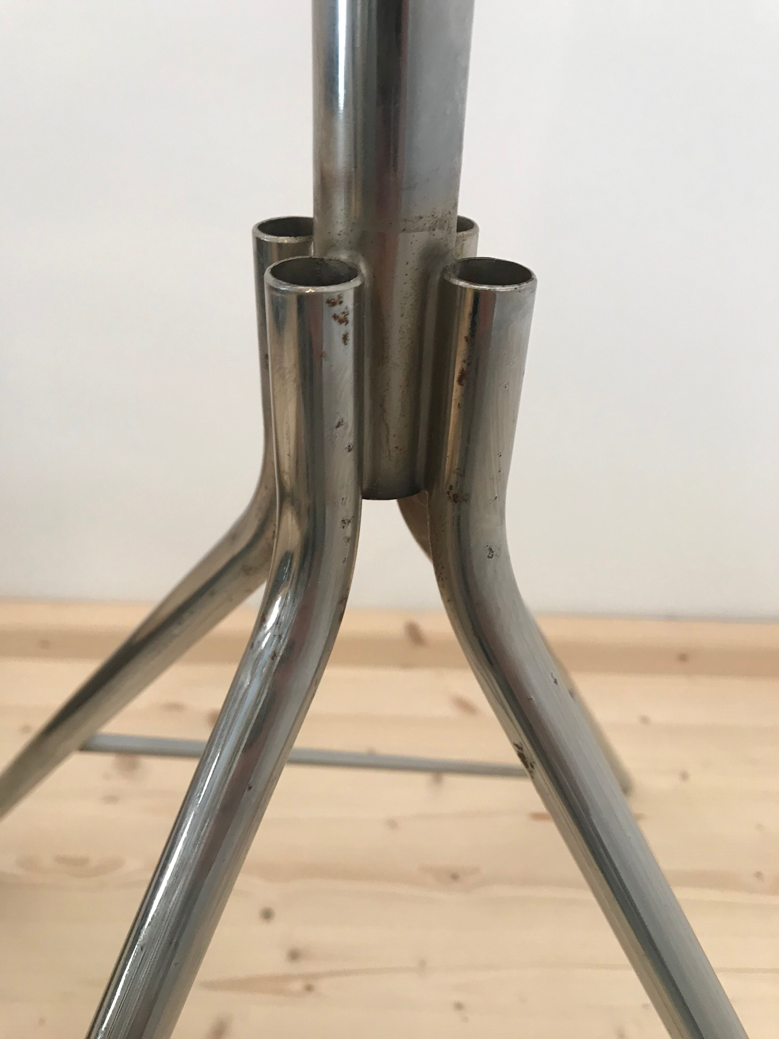 Wearing chrome parrot coat, black and multicolored balls