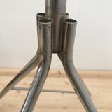 Wearing chrome parrot coat, black and multicolored balls