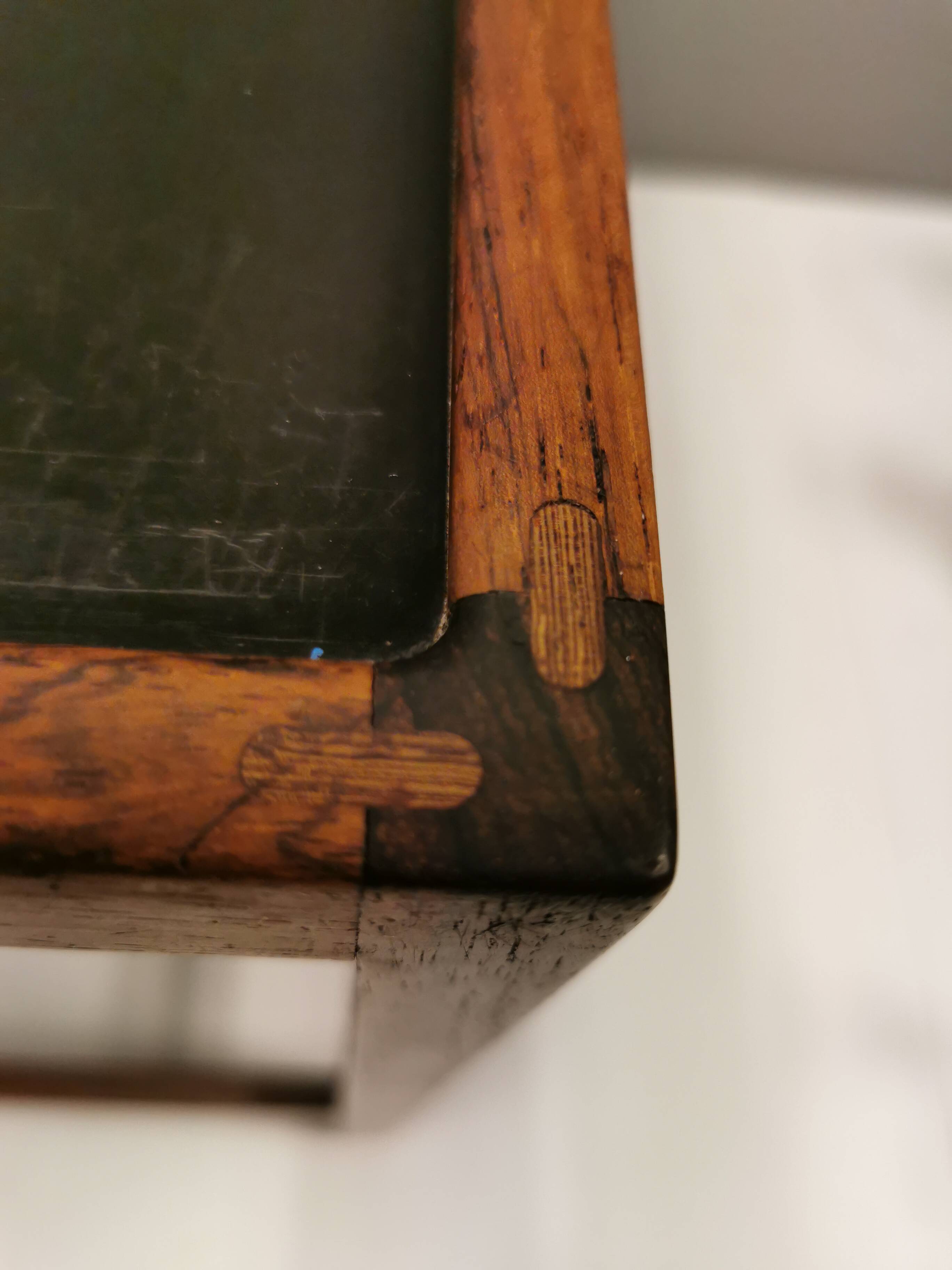 Smaller lamp/Side table of rosewood with black formica tabletop, designed by Kurt Østervig.