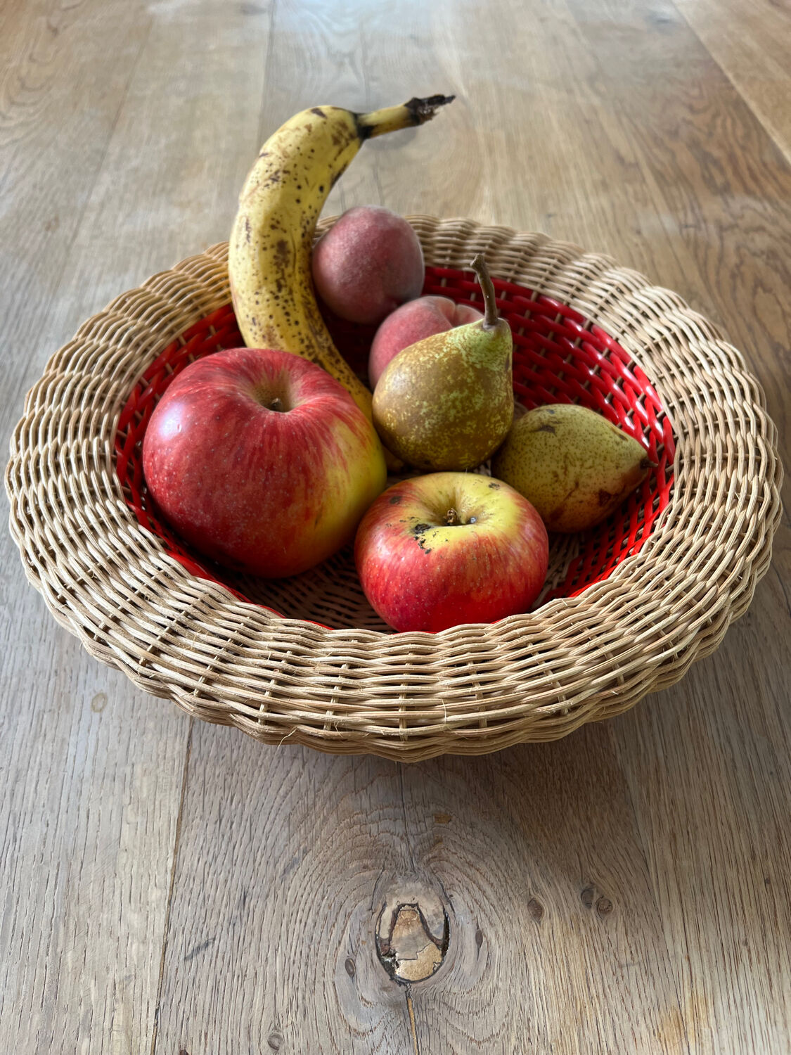 Rattan basket with red trim