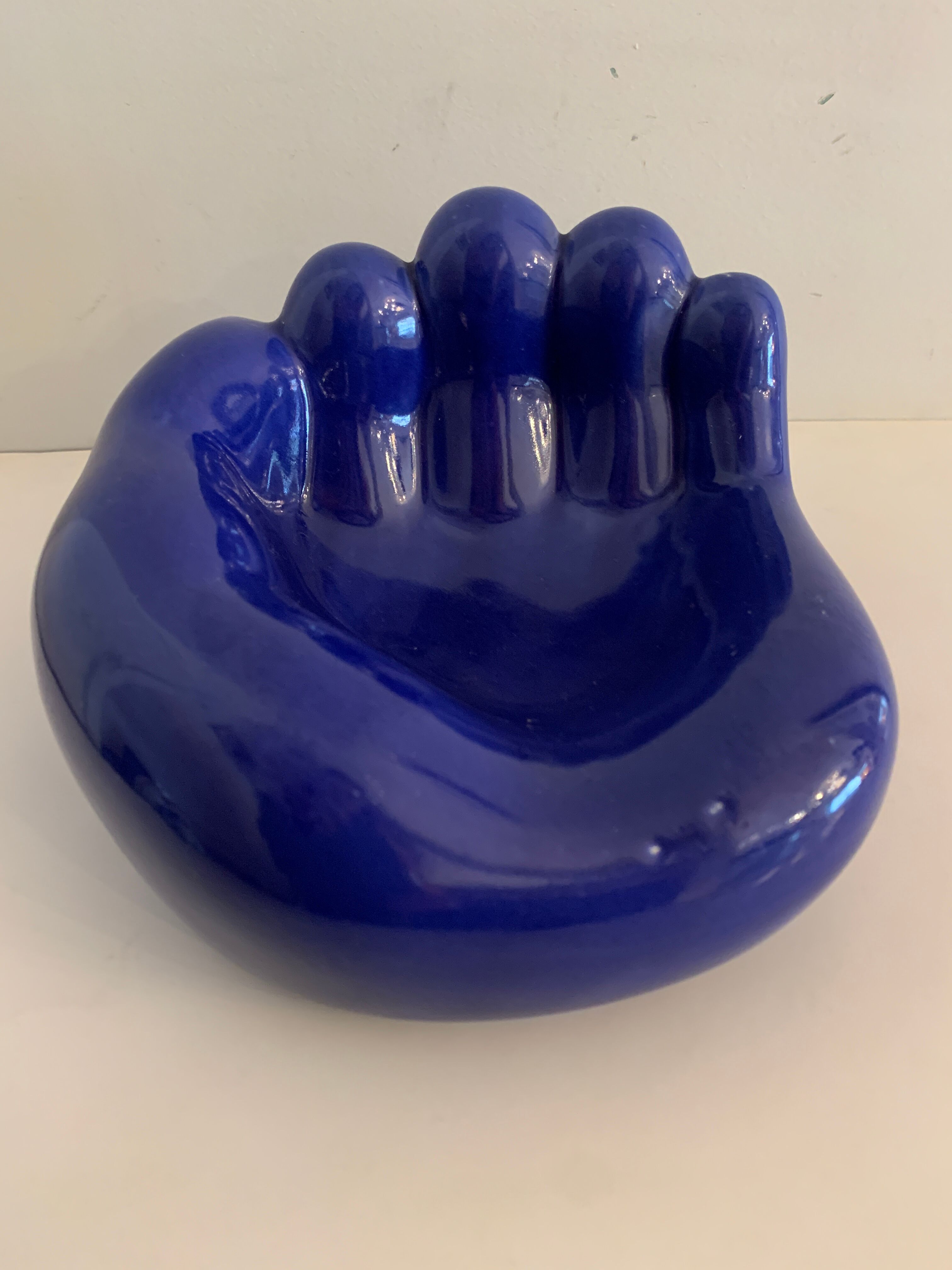 Ceramic ashtray, blue hand shape