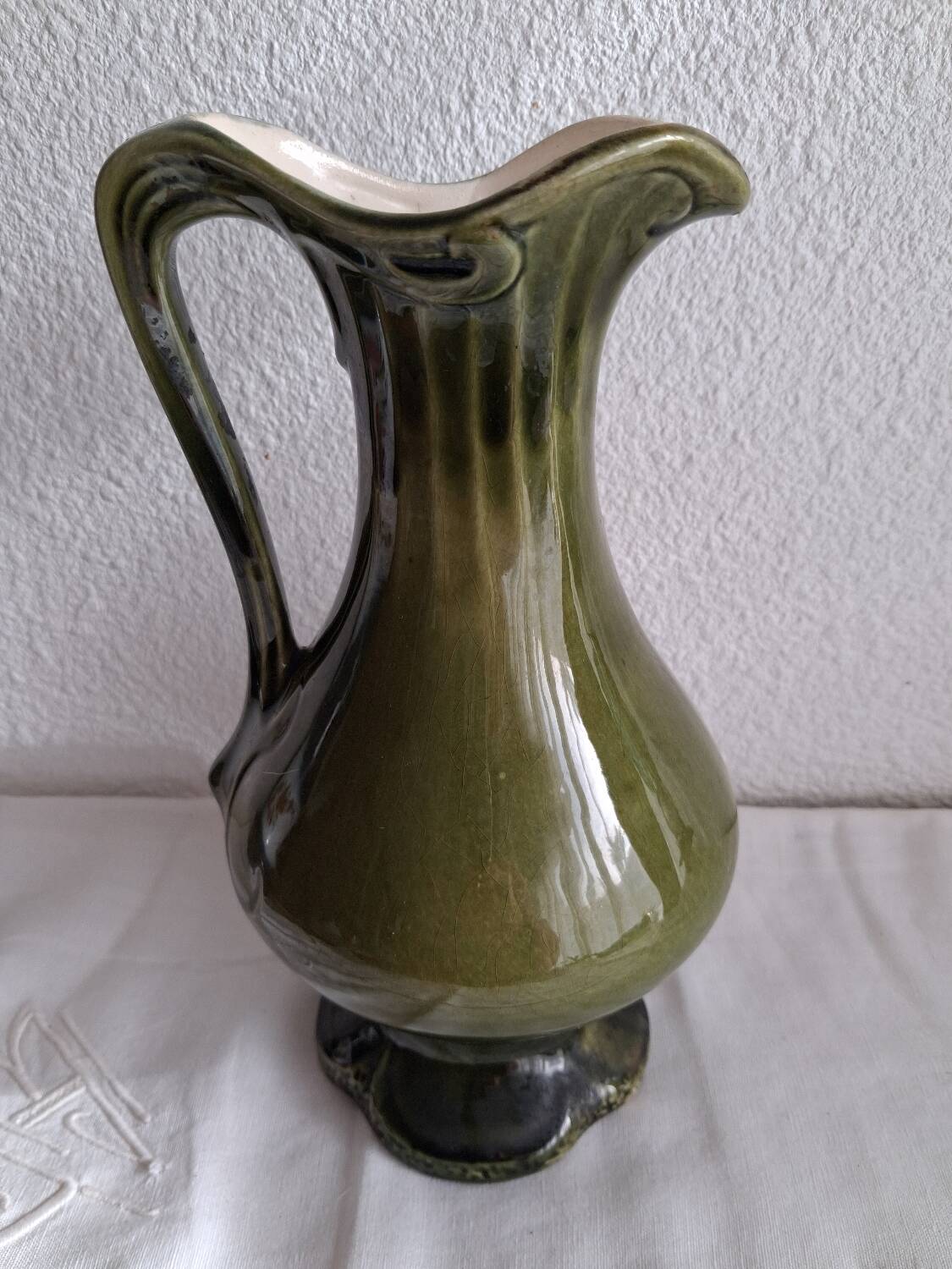 Art Nouveau pitcher in slipware