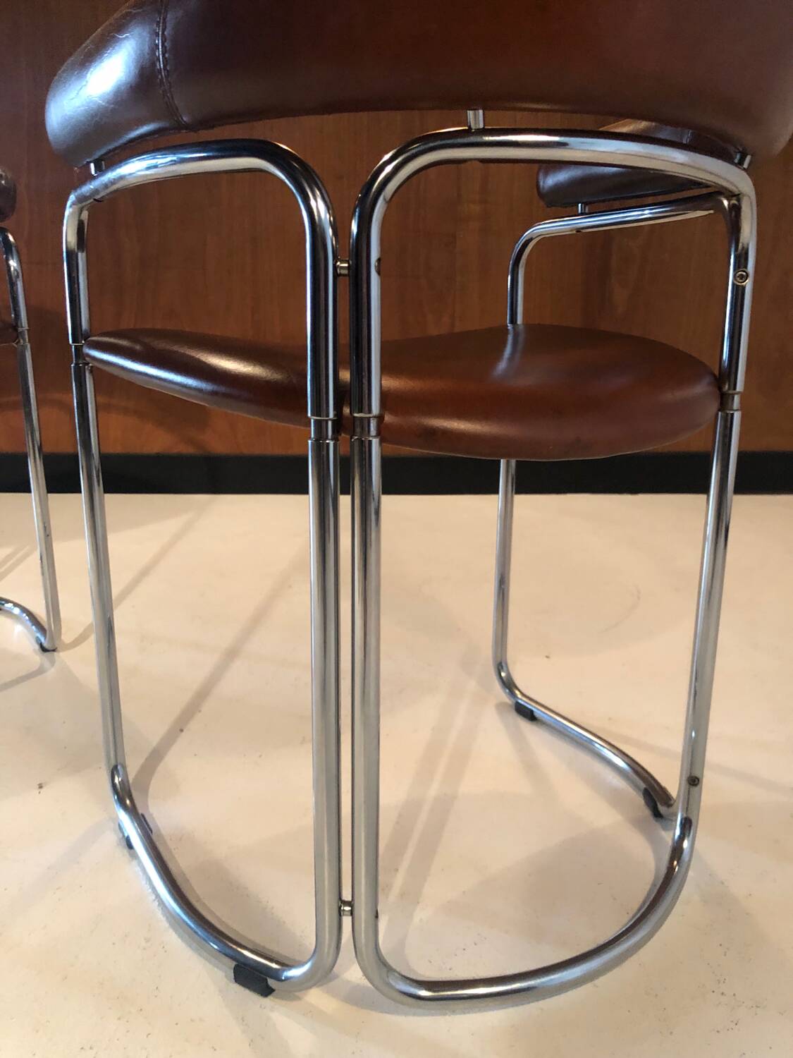 Pair of vintage armchairs, cognac leather and chrome steel 1970